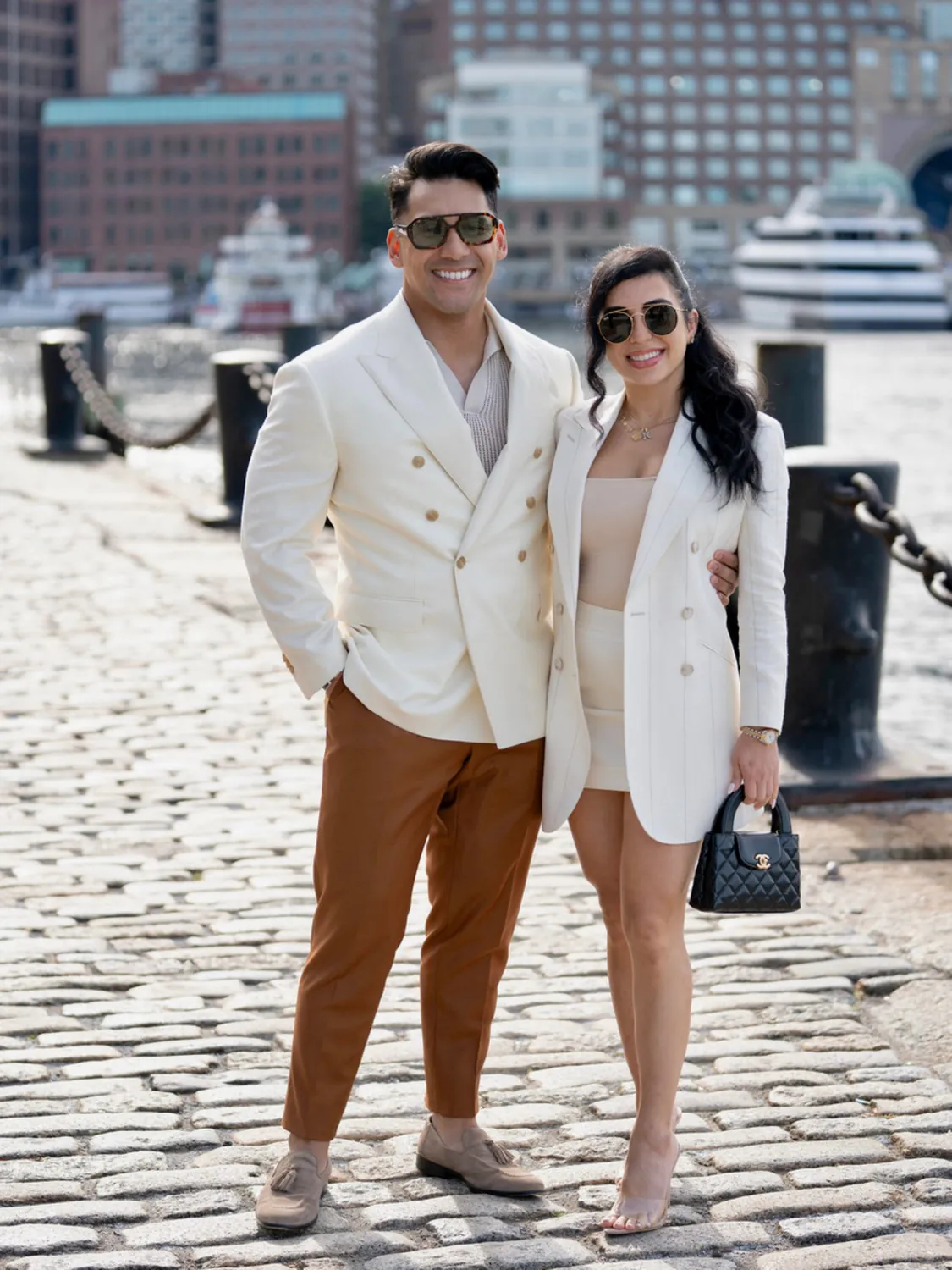Doug and Natalie on the Boston waterfront in cream and white.